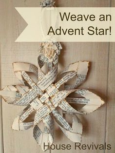 a snowflake made out of old book pages with the words we have an advert star on it