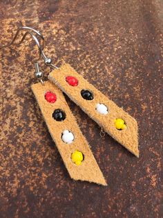 I created these earrings from original leather scraps that beaded with the colors of the traditional medicine wheel. Each of my creations is inspired by nature. Thank you and fun! Beaded Keychains Patterns, Felted Earrings, Native American Beadwork Patterns, Beaded Moccasins, Beading For Kids, Beautiful Beaded Jewelry, Beaded Earrings Tutorials, Beaded Earrings Diy, Native American Earrings