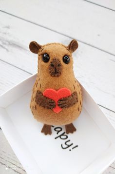 Capybara plush pocket hug in a matchbox Felt Plushies, One Year Anniversary Gift, Capybara Plush, Anniversary Gift For Boyfriend, One Year Anniversary Gifts, Felt Creations, Long Distance Relationship Gifts, Pocket Hug, Cute Presents