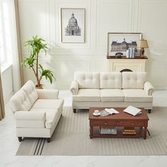 a living room with two couches and a coffee table