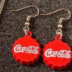 Brand New! Boutique Item! Charming Mini Coca Cola Bottle Cap Round Dangle Earrings! Cute & Small Dangle Earrings Made To Look Like Bottle Caps Of The Soda "Coke". See Pictures For Details. Comfortable & Easy To Wear. I Think We All Know Someone Who Is A Soda Addict - This Is The Perfect Gift For The Coke Brand Snob In Your Life!! Or Give To The Pepsi Lover In Your Family And Watch The Eyes Rollllllll!! Great Gag Gift! -Brand New, Never Worn -Great Gift / Present - Bundle Items In My Closet. The Casual Red Earrings For Party, Casual Red Party Earrings, Casual Red Metal Jewelry, Nickel-free Casual Party Earrings, Casual Red Nickel-free Earrings, Casual Nickel-free Earrings For Party, Fun Red Round Jewelry, Small Dangle Earrings, Cola Bottle