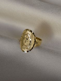 DESCRIPTIONA statement ring if we ever saw one. This ring features the virgin Mary looking rather stunning on a wide band. Guaranteed to have people staring at your... hands. This piece requires custom sizing, making it final sale. DETAILS- always made in 14k gold Virgencita Gold Ring, Gold Mexican Rings, Mexican Gold Rings, Cute Gold Rings, Mexican Rings, Gold Jewlry, Virgin Mary Ring, People Staring, Custom Gold Jewelry