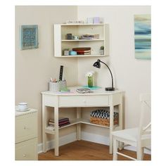 a white desk and chair in a room