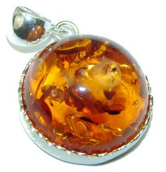 Handmade Unique 925 Sterling Silver pendant with unique one of a kind Amber,  9.50 grams of marvelous handcrafted jewelry design. Only one piece availble ready to ship! It's unique worldwide pendant - simply piece of art in world of fine jewelry. Authentic Baltic Amber  .925 Sterling Silver handmade Pendant  PENDANT DETAILS: Weight: 9.50g; Material: Sterling Silver; Main stone: Amber; Dimension: L - 1 1/2, W - 1, T - 3/8 inch; Inner Bail Diameter: 1/4 inch; Stamp / Mark: 925; Condition: New; Mai Amber Sterling Silver Round Pendant Jewelry, Unique Stamped 925 Round Pendant Jewelry, Artistic 925 Stamped Jewelry As Gift, Artistic 925 Stamped Jewelry For Gifts, Collectible Round Amber Jewelry, Amber Pendant Jewelry Stamped 925, Unique Amber Jewelry Stamped 925, Handmade Amber Sterling Silver Jewelry, Artisan Amber Sterling Silver Jewelry