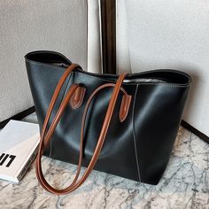 Material: PU Texture: Soft Closed: Zipper Size: 16.1"L x 4.7"W x 11"H in; It is enough to hold daily stuffs including cell phones, sunglasses, wallet, key etc. Strap length: 12.2 inches Small Buckets, نظارات شمسية, High Heel Sneakers, Cross Body Bags, Bags Tote, Big Bags, Shoulder Messenger Bag, Boots And Sneakers, Women's Handbags