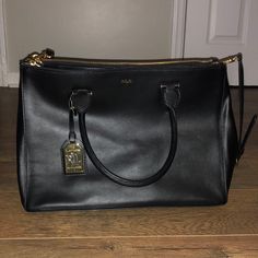 Nwot Ralph Lauren Black Purse. This Thing Is Huge! Would Even Hold A Laptop. So Many Compartments With Zippers. Loved This Purse When I Bought It But Just Too Big For Me. No Wear Or Discoloration. Ralph Lauren Bag With Gold-tone Hardware For Shopping, Ralph Lauren Shopping Bag With Gold-tone Hardware, Elegant Ralph Lauren Bags With Gold-tone Hardware, Elegant Black Ralph Lauren Bags, Elegant Ralph Lauren Bags For Workwear, Elegant Ralph Lauren Bags For Work, Ralph Lauren Purse, Longchamp Medium, Mcm Purse