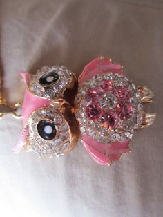 "very nice vintae monet owl necklace,,pink rhinestones and clear stones with pink enamel wings 2\" long  with  gold chain with monet tag" Exquisite Pink Pendant Necklace, Bohemian Pink Pendant Crystal Necklace, Pink Angel Wing Necklace, Gold Owl, Owl Jewelry Necklace, Owl Pendant Necklace, Vintage Monet, Owl Necklace, Clear Stone