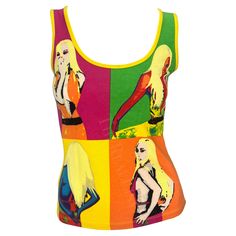 Presenting an iconic vibrant pop art Versace tank top, designed by Donatella Versace. From the Spring/Summer 2004 collection, this top debuted on the season's runway as part of look 31 modeled by Karolina Kurkova. Its front showcases pop art-inspired images of Donatella in her iconic Spring 2000 pink jungle print dress, while the back features a cheeky 'call me 1 900 d-o-n-a-t-e-l-l-a', exemplifying Versace's playful extravagance. Approximate measurements: Size - 42IT/8US Shoulder to hem: 21" Bu Gucci Pullover, Versace Donatella, Pop Art Dress, Iconic Shirts, Inspired Images, Versace Shirts, Karolina Kurkova, 00s Fashion, 2000 Fashion