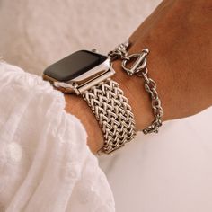 Elevate your style game with the Nova Stainless Band, one of our most feminine apple watch bands. Skillfully made from premium stainless steel, this band transforms your Apple Watch from a simple timepiece into a stunning fashion accessory. Furthermore, its unique design ensures you stand out, adding a touch of sophistication to your everyday look. Additionally, the Nova Stainless Band, one of the most feminine Apple Watch bands available, offers a variety of color choices, including Gold, Rose Gold, Silver, Starlight, and Black. Each color pairs beautifully with an elegant jewelry clasp, enhancing the overall aesthetic. Moreover, the band weighs a mere 80g (2.8 oz) and measures 2cm (0.8") in width. Therefore, it's not only visually appealing but also comfortable for all-day wear. Compatib Apple Bands For Women, Apple Watch Bands Starlight, Dressy Apple Watch Bands Women, Silver Timeless Bracelet Strap Watch Bands, Timeless Silver Watch Band With Bracelet Strap, Timeless Silver Bracelet Strap Watch Band, Classic Adjustable Silver Watch Band, Classic Metal Watch Bands For Gifts, Modern Adjustable White Gold Apple Watch Band