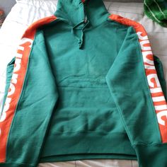 Brand New Never Used Supreme Hoodie. Green Hoodie With Adjustable Hood, Sportswear Hoodie With Logo And Long Sleeves, Sportswear Hoodie With Logo, Sportswear Long Sleeve Hoodie With Logo, Green Hooded Jacket With Ribbed Cuffs, Winter Sportswear Hoodie With Logo Detail, Supreme Sweater, Supreme Hoodie, Colorful Hoodies