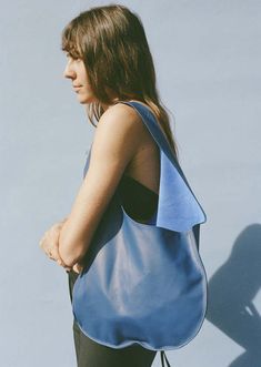 A buttery soft leather tote bag from maryam nassir zadeh with ovular construction and a wide flat strap.    composition | 100% calf leather    dimensions | w 14" x h 22"    made in the usa Yale Blue, Soft Leather Tote, Maryam Nassir Zadeh, Longchamp Le Pliage, Womens Tote, Leather Tote Bag, Leather Tote, Calf Leather, Soft Leather