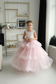 Gorgeous handmade flower girl dress with full layered tulle skirt. This gown has satin top with an open V-back and is decorated with a big bow. You can also add the tulle train to your dress, which will be a nice addition to your little princess's look. Moreover the train is removable and you can detach it any time during your special occasion. Available in the following colors: - blush (like in the pictures) - white - ivory - black Size US 1 Age 1.5 Height 86cm/34in Chest 51cm/20in Waist 51cm/2 Flower Girl Dresses Blush, Dusty Rose Flower Girl Dress, Light Pink Flower Girl Dress, Blush Pink Flowergirl Dress, Kid Dress With Rose, Girl Wedding Dress, Pink Flower Girl Dress, Tutu Flower Girl Dress, Wedding Dress Satin