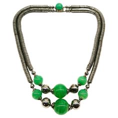 An Art Deco chrome and glass two row necklace, French, 1930s | From a unique collection of vintage Drop Necklaces at https://www.1stdibs.com/jewelry/necklaces/drop-necklaces/. 1st Dibs, Metal Cups, Chrome Metal, 1930s Art Deco, Deco Jewelry, Art Deco Jewelry, Contemporary Jewelry, Drop Necklace, Glass Bead