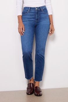 With a classic straight leg and versatile blue wash, you'll be wearing these Paige jeans on repeat. The Cindy is crafted in soft stretch denim and features a flattering high rise and raw cut hems. Dark Wash Mom Fit Straight Leg Cropped Jeans, Dark Wash Straight Leg Mom Fit Cropped Jeans, Dark Wash Straight Leg Jeans With Frayed Hem, Medium Wash Straight Leg Cropped Jeans With Frayed Hem, Mom Fit Dark Wash Cropped Jeans With Frayed Hem, Medium Wash Straight Leg Jeans With Frayed Hem, Straight Leg Medium Wash Jeans With Frayed Hem, Everyday Cropped Jeans With Frayed Hem And Straight Leg, Mom Fit Denim Cropped Jeans With Frayed Hem