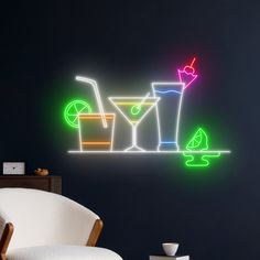 a neon sign that is on the side of a wall next to a white chair