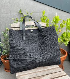 LIDYA black : 100% handmade,large paperyarn handbag with genuine leather handles. Perfect for day use,travel  and beach  Size : 50*40cm height  Please do not hesitate to contact me for other colour options . Due to the handmade nature of the bags, interior lining may change according to stock and there may be slight variations in size. Luxury Style, Leather Handles, Leather Handle, Purses And Handbags, Handmade Natural, Color Options, Shoulder Bags, Etsy Accessories, Genuine Leather