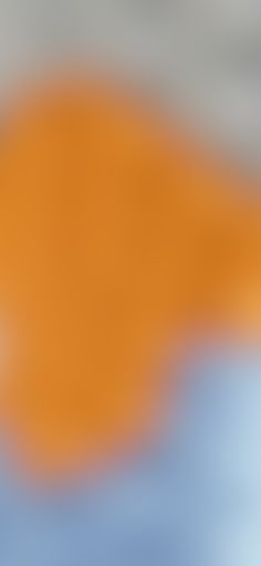 blurry image of an orange and blue sky