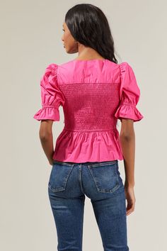 When it comes to visuals, the Chelsa Peplum Smocked Top knows how to come out on top! It shapes a front tie, a smocked bodice, and puff half short sleeves with elastic and ruffles. Set-in waist tops the flouncy peplum hem. It’s a unique top to match with some denim jeans and pink heels or sandals! - Smocked- Peplum- Puff sleeves- Breathable- Comes in 2 colorsSize + Fit - Model is 5'8" and wearing size XS- Measurements taken from size S - Chest: 13 1/2"- Length: 22" Fabric STT16759 Style Number S Unique Top, Smocked Top, Peplum Hem, Pink Heels, Puff Sleeves, Smocking, Puff Sleeve, Ruffles, Denim Jeans