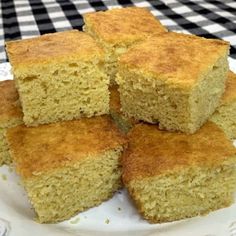 several pieces of cornbread on a white plate