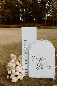 flowers are placed in front of a grave