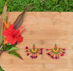 Kalbeliya Gypsy Tribal Necklaces- Mirabelle Handmade Kalbeliya earrings with sterling silver posts in glorious color combos of beaded work and tassels. These bold beauties mimic the flamboyancy of the Kalbeliya tribal people. Each pair is made by a woman, a dancer from the tribe, named Moriya. She makes each piece with love and an eagerness to demonstrate a taste of her culture. Kalbeliya tribe people are known for snake charming and trading snake venom. They are also called Saperas or Snake Cha Traditional Beaded Latkans Drop Earrings, Bohemian Tassel Earrings With Latkans For Festivals, Traditional Multicolor Beaded Earrings For Festive Occasion, Bohemian Multicolor Tassel Earrings For Festive Occasions, Traditional Beaded Chandelier Earrings For Festive Occasions, Bohemian Multicolor Chandelier Earrings For Celebrations, Multicolor Bohemian Chandelier Earrings For Celebrations, Bohemian Green Chandelier Earrings For Festive Occasions, Festive Fair Trade Jewelry For Festivals