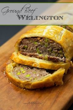 a meat wellington on a cutting board with the words ground beef wellington written in it