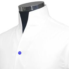 "Men's High Open V Collar Plain White 100% Cotton Long Sleeves Dress Shirt In Multi Color Buttons, Cotrast Buttons, Rainbow Buttons MADE-TO-ORDER CLOTHES Shirt Style: Karl Lagerfeld Style/ High Chinese Mandarin Collar/ High Open V Collar Collar Style: 3\" High Stiff Buttonless Collar Pockets: Without pocket (Chest pocket can be added on request) Fabric: 100% Giza cotton soft & comfortable fabric Sleeves: Full Sleeves/ Long Sleeves Fine stitched (20-21 stitches per inch) Cleanly finished button holes Flat Felled Seams Hand cut and sewed individually High-quality tailoring Savile Row / British style collar Cuff: 4\" wide single cuff, with 3 buttons These shirts are made with a single cuff. For the double cuff, please leave us a message. * The shirts are made on order in our family-run worksh White Stand Collar Shirt With Button Closure, Fitted Shirt With Stand Collar And Button Closure, Fitted Shirt With Stand Collar And Buttons, Fitted Dress Shirt With Buttons For Daywear, White Shirt With Covered Buttons For Daywear, Fitted Shirt With Covered Buttons, Fitted White Tops With Hidden Button Closure, Semi-formal Fitted Top With Stand Collar, White Fitted Top With Hidden Button Closure