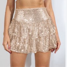 Gold Sequin Ruffle Skirt With Built In Shorts Size Medium New Without Tags Gold Sequined Bottoms For Summer, Spring Party Bottoms With Ruffled Skirt, Spring Party Ruffled Skirt Bottoms, Spring Party Ruffled Skirt, Spring Party Skort With Ruffles, Spring Party Ruffled Skort, Spring Ruffled Skort For Night Out, Trendy Party Skort With Ruffled Skirt, High Waist Ruffled Mini Skirt For Party