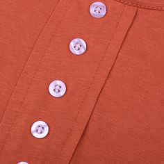 Rust Red Button Detail Short Sleeve Tees Henley Neckline T-shirt With Buttons For Spring, Casual Tops With Side Buttons For Summer, Orange Button Closure Top For Fall, Henley Neckline Button T-shirt For Spring, Henley Neckline Buttoned T-shirt For Spring, Fall Orange Tops With Button Closure, Fall Orange Top With Button Closure, Orange Buttoned Tops For Fall, Orange Short Sleeve Top With Buttons