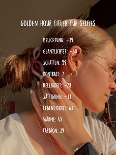 a woman with her hair in a bun is wearing glasses and has the words golden hour filter