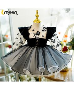 Get 10% off now! Buy black ruffled tulle unique long sleeved party dress for girls at cheap price online. Free stable shipping and pro custom service since 2009. Spring Party Long Sleeve Dress With Ruffles, Party Long Sleeve Dress With Ruffles, Black Halloween Dress With Sheer Sleeves, Fitted Long Sleeve Princess Dress With Ruffles, Spring Evening Princess Dress In Tulle, Spring Evening Tulle Princess Dress, Long Sleeve Tulle Tutu Dress With Ruffles, Spring Party Tutu Dress With Long Sleeves, Spring Party Long Sleeve Tutu Dress