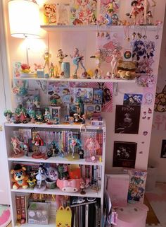 a room filled with lots of toy figurines and toys on top of shelves