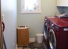 a washer and dryer in a small room