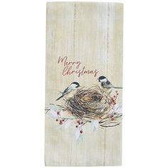 a christmas card with two birds sitting on top of a nest