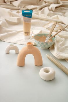 an assortment of crafting supplies including doughnuts, toothbrushes and other items