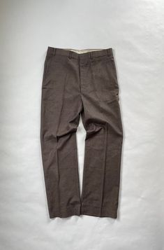 "Vintage New with Tags Sears Regular Fit Trousers Size: 36 x 31 Reg. Era: 1980's Material: 50% Polyester, 25% Rayon, 25% Acrylic Made in USA Details: New with Tags - Deadstock Sears Regular Fit Brown Trousers with Flap Pocket Back Pocket. All New, Perfect Condition. Flat Measurements - Waist - 17\" Inseam - 31\" Leg Opening - 9.5\"" Brown Trousers, Fitted Trousers, Saint Paul, Mens Trousers, Flap Pocket, Parachute Pants, Mens Pants, Made In Usa, Sweatpants