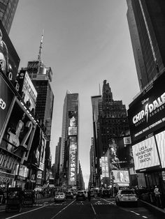 black and white photograph of times square in new york city