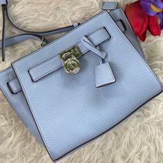 Nwot Gorgeous Attractive Baby Blue Color See Measurements For Size In The Pics Leather Pics Taken Under Daylight With No Filter Blue Leather Bag With Turn-lock Closure, Light Blue Leather Bags With Gold-tone Hardware, Blue Travel Bag With Turn-lock Closure, Luxury Light Blue Bags With Silver-tone Hardware, Blue Michael Kors Tote Shoulder Bag, Light Blue Everyday Bag With Branded Hardware, Light Blue Everyday Bags With Branded Hardware, Light Blue Leather Bag With Branded Hardware, Michael Kors Blue Shoulder Bag With Removable Pouch