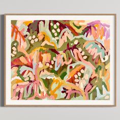 an abstract painting with pink, orange and green leaves on the bottom half of it