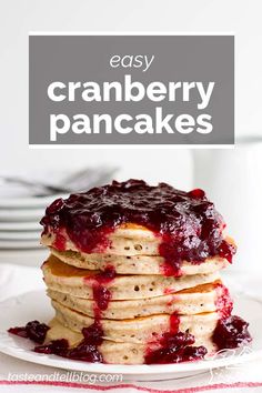 stack of cranberry pancakes on a plate with the words easy cranberry pancakes