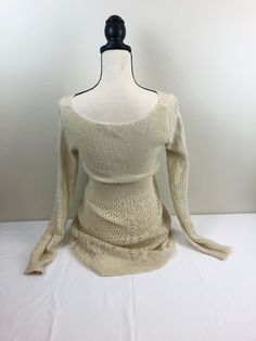 Women’s sweater dress cream wool bag 1M ch Cream Long Sleeve Knit Sweater Dress, Cream Knit Long Sleeve Sweater Dress, Long Sleeve Cream Knit Sweater Dress, Cozy Cream Sweater Dress For Spring, Casual Cream Knit Sweater Dress, Cream Long Sleeve Sweater Dress For Fall, Chic Cream Long Sleeve Sweater Dress, Casual Long Beige Sweater Dress, Chic Long Sleeve Neutral Sweater Dress