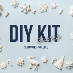 the word diy kit is surrounded by snowflakes and christmas decorations on a blue background