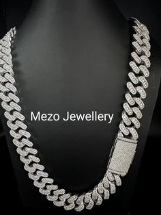 "Heavy Solid 925 Sterling Silver Men's VVS1 Moissanite Diamonds Miami Cuban Curb Chain Anti-Tarnish 25 mm wide 16\"-28\" Inch\" All Sizes ( Available Message For Size And MM sizes Price will Vary ) Fine Quality Box Lock Clasp, Moissanite studed Pass The Diamond Tester Test - 40-80Ct VVS1 Quality Moissanite studded/White D colour Super ICY you have to see to believe!! GRA certified SOLID 925 Sterling silver...finished in rhodium for a shiny ICY look Not plated or filled...this is SOLID silver Wil Silver Diamond Cuban Link Jewelry, Silver Diamond Cuban Link Necklace With Bling, Silver Diamond Cuban Link Necklace, Silver Cuban Link Necklace With Diamond Accents, Anniversary Silver Cuban Link Chain Necklace, Silver Rectangular Diamond Jewelry, Silver Cuban Link Necklace Iced Out With Cubic Zirconia, Silver Cuban Link Necklace With Iced Out Cubic Zirconia, Silver Cuban Link Chain Necklace For Anniversary