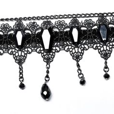 This price is for a choker only, others are not included.  1. Made of hollow out lace  2. Hand sewn coffin shaped beads,adding gothic and mystery feeling  3. Delicate suspended chain pendants enrich the vision  4. Adjustable chain at the end of choker  5. 100％Polyamide   	 		 			Size 			Free Size 		 		 			Full Length 			29 Gothic Metal Body Jewelry For Party, Emo Style Silver Choker For Party, Emo Silver Choker For Party, Emo Metal Choker For Halloween, Emo Style Metal Choker For Halloween, Gothic Party Body Jewelry With Chain, Gothic Body Jewelry With Chain For Party, Emo Halloween Party Necklaces, Emo Metal Necklace For Party