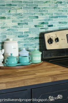 a kitchen counter with an oven and microwave on it