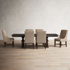 a dining room table with chairs and a bench in front of it on a hard wood floor