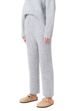 These woolly full-of-comfort pants are ideal for running errands or lounging by the fire. Pull-on style Side pockets 70% polyester, 21% nylon, 8% wool, 1% spandex Hand wash, dry flat Imported Silk Lounge Pants, Comfort Pants, Knit Lounge Set, English Factory, December 2023, Wide Pants, Laid Back Style, Sweater Pants, Womens Sweatpants