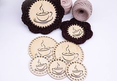 crocheted coasters with coffee cups on them