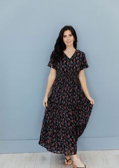 Eden modest maxi dress in black floral-NEW – JanieLanie Bohemian V-neck Maxi Dress With Elastic Waistband, Modest Maxi Dress With Elastic Waistband, Black Maxi Dress With Elastic Waistband, Modest Black Flowy Maxi Dress, Black Flowy Maxi Dress Modest Style, Modest Black Floral Print Maxi Dress, Modest Black Maxi Dress With Floral Print, Modest Black Maxi Dress, Modest Boutique