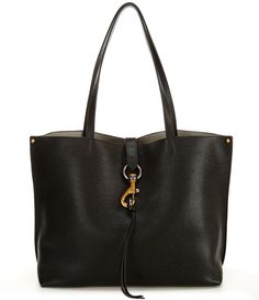 From REBECCA MINKOFF, the Megan Black Leather Tote Bag features: LeatherMulticolor hardwareMagnet snap closureBlack lining1 back slip interior pocket1 back slip exterior pocketApprox. 16.75" W x 11.5" H x 5.75" D bag; 10" strap dropImported. Office Leather Bag With Metal Hardware, Office Bag With Leather And Metal Hardware, Leather Tote Bag With Metal Hardware, Modern Tote Shoulder Bag With Brass Hardware, Leather Shoulder Bag With Metal Hardware For Daily Use, Workwear Shoulder Bags With Brass Hardware, Top Handle Bags With Brass Hardware For Work, Modern Shoulder Bag With Brass Hardware, Modern Shoulder Bags With Brass Hardware